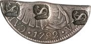 ½ Dollar Countermark on 1/3-cut Spanish or Spanish Colonial 8 Reales, without plug obverse image