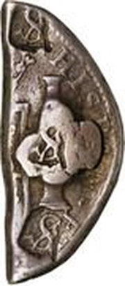 ½ Dollar Countermark on 1/3-cut Spanish or Spanish Colonial 8 Reales, with plug obverse image
