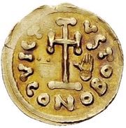 Tremissis in the name of Justinian II hand at right reverse image